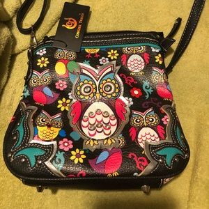 Super cute small cross body purse with Owls